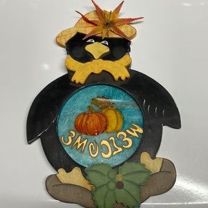 Black crow welcome sign